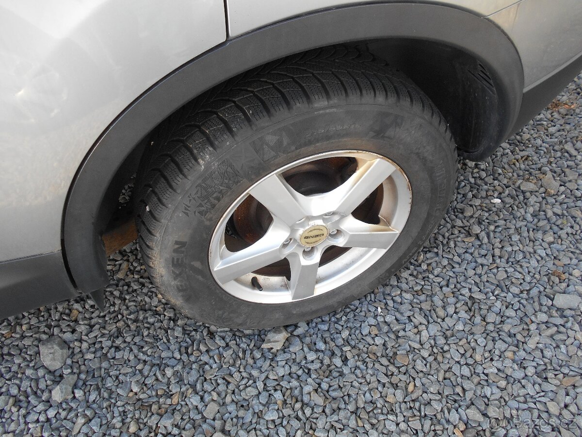 Nissan Qashqai +2 2.0 i 7 mist - 12