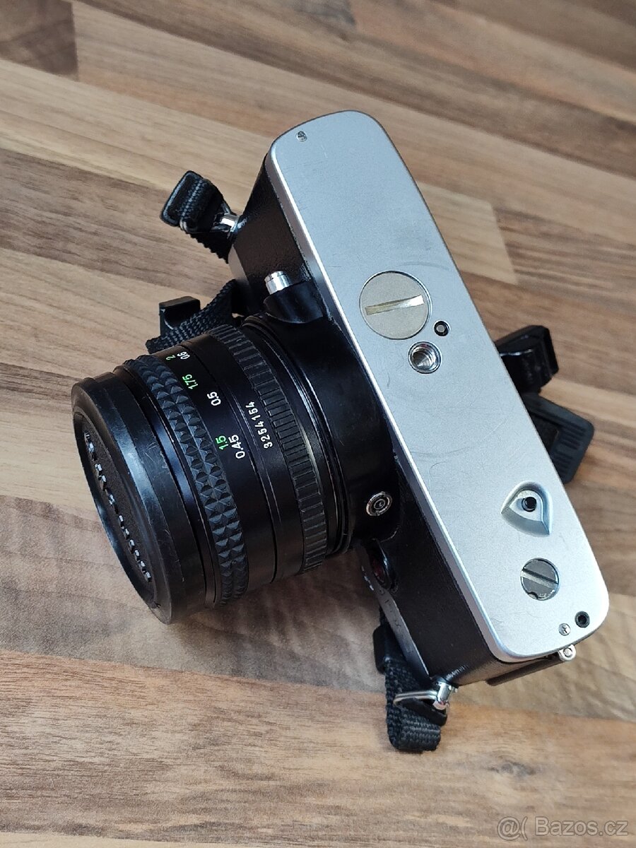Minolta XG-9 + Rokkor 50/1.4 - 12