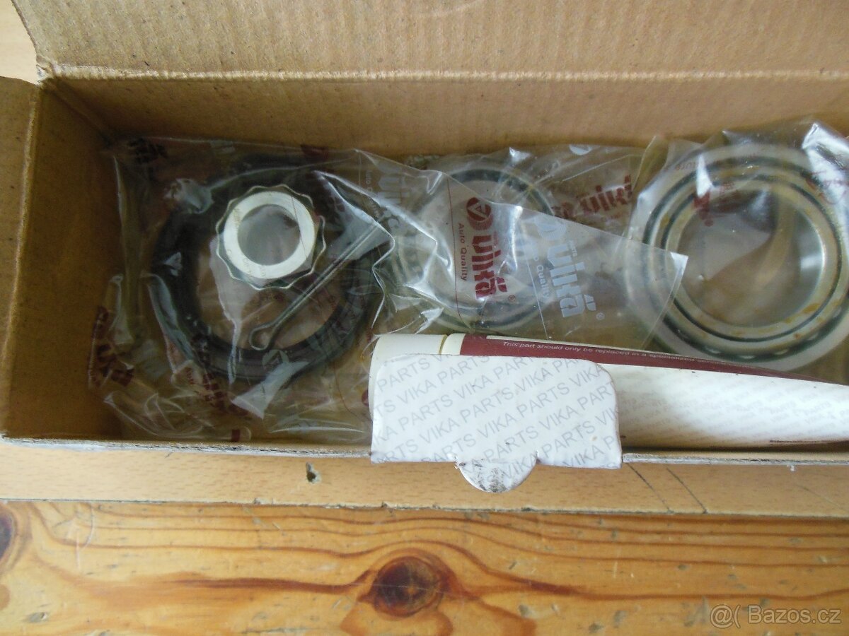 Zapalovací cívka, třmem zadní nápravy.pružiny, ložisko - 12