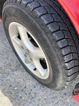 Mazda 323f ba 1.5 - 12