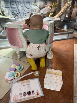 REALISTICKÁ PANENKA S ČELENKOU N.O.V.Á. - 12