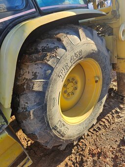 Traktorbagr Caterpillar 428D 4X4 + sbíjecí kladivo - 12