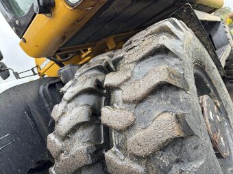 Kolový rypadlo Caterpillar M316D - 12