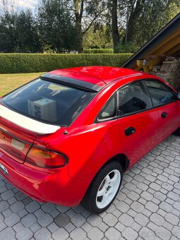 Mazda 323f - 12