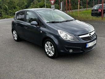Opel Corsa 1.4i 66kw, r.2008, 1.majitel, klima, STK - 12