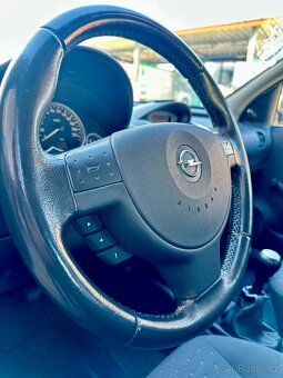 Opel Corsa 1.2 V16 - 12