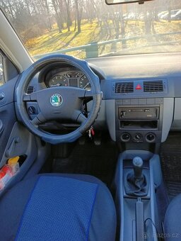 Škoda Fabia 1,4i - 12