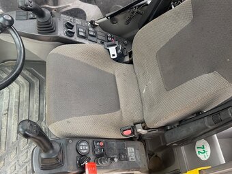 Kolový bagr Volvo EW140C - 12