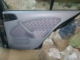 Škoda Octavia 1 Sedan - Kapota, dveře, nárazníky - 12