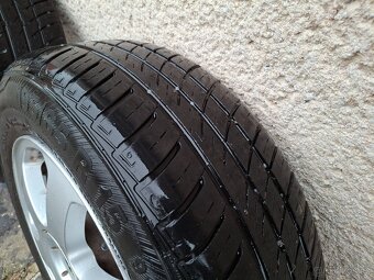 ALU ORIG. ŠKODA 15" 5x100 57,1 Střed - 12