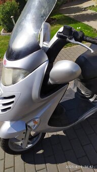 Kymco Grand Dink 125 - 12