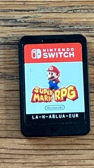 Nintendo Switch OLED + 7 her - 12