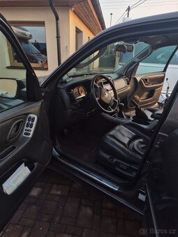 Mazda tribute  4x4 2.3i - 12
