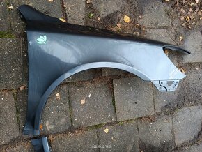 Skoda Octavia 2 facelift - přední nárazník, blatník - 12