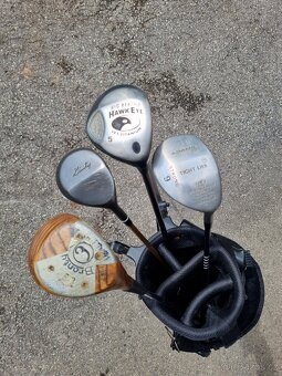 4 different Golf clubs - 12