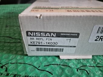 chromové rámečky zadních mlhovek Nissan Juke (F15) od 072010 - 12