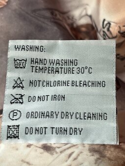 Dámský kabát s náplety vel. L - 12