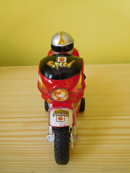 Kostky, hodiny, puzzle,motorka - 12