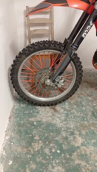Prodám KTM 144 sx, rok 2008 ,nový olej, destičky, ložiska v - 12