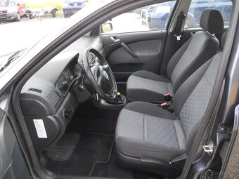 Škoda Octavia 1.9 TDi 74Kw TOUR - 12