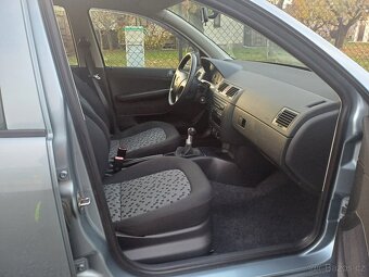 Benzínová Škoda Fabia 1.4 FACELIFT - 12