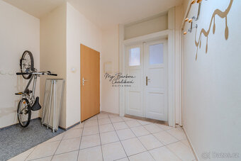 Prodej krásného bytu 2+kk s předzahrádkou a zahradou v ul. E - 12