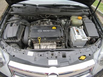 Astra 1,6 i - 12