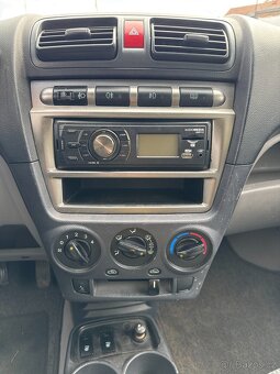Kia Picanto 1.1i 48 kW - 12