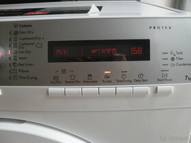 ZNAČKOVÁ SUŠIČKA PRÁDLA S TEPELNÝM ČERPADLEM AEG-7KG,tř.A+ - 12