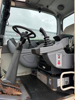 Kolový otočný bagr TEREX TW 110 - 12