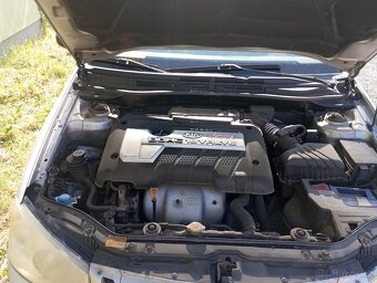 Kia Cerato 2.0i 16v / 105 kw - 12