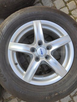 Prodám zánovní letní kola 17 5x127 ET 36 zánovní letní pneu - 12