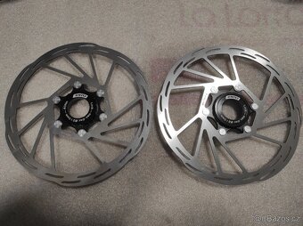 Spousta nových brzdových kotoučů 6 děr a CL. - 12