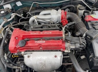 Mazda 323f 1.5 65 KW DOHC. Klima, el.okna, ALU kola - 12