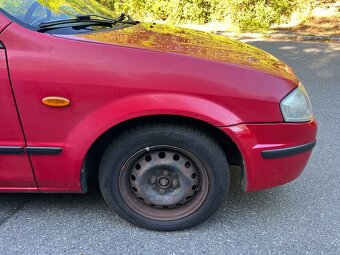 Mazda 323f bj 1.5 STK 7/26 - 12