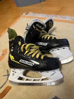 Dětské hokejove brusle Bauer Junior Supreme M4 - 12