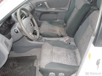 Mazda 323 F 1.3 i - 12