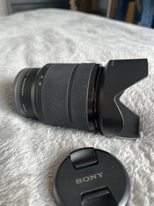 Objektiv Sony 28-70 mm f/3,5-5,6 OSS - 12
