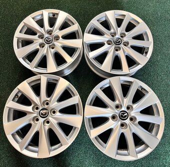 5x114,3 R17 Orig. alu disky Mazda - ET 50 - 12