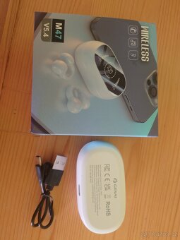 Bezdrátova sluchátka, nová. - 12