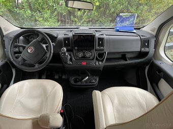 Obytný vůz alkovna XGO - 12