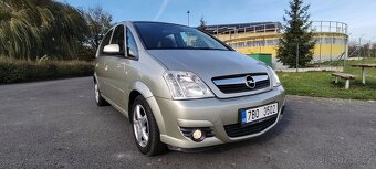 Opel Meriva 1.4i 66Kw benzin, r.v.2010 nová STK,nové pneu - 12