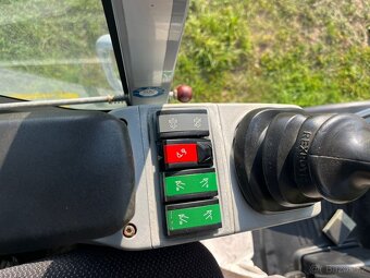 Kolový bagr Wacker Neuson EW100 - 12