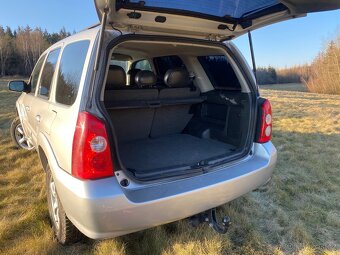 Mazda Tribute 2,3 - 12