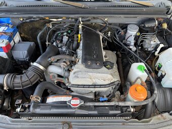 Suzuki Jimny 1,3i 4x4 - 12