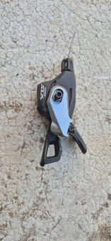 Přehazovače a páčky Sram, Shimano - 12
