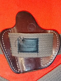 Kožená taška, opasky 2 ks a pouzdro na zbraň zn. LOBO - 12