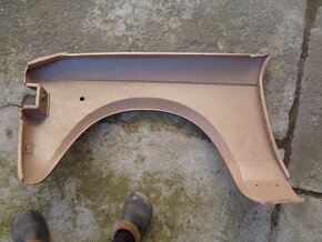 Fiat 128 nebo zastava předni blatniky original nepoužite - 12