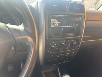 Suzuki Jimny 1.3i 63kW 4x4 - 12