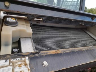 Šmykový nakladač Bobcat S100, TP. - 12